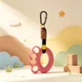 Pink finger grip strengthener, portable hand exercise ring keychain variant for training. - Orange
