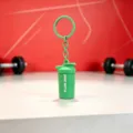 Green shaker bottle keychain, mini sports fitness cup pendant, stylish bag charm accessory. - Drip Glue Sports Bottle Pendant / Green
