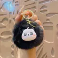 Black plush pom pom keychain with cute panda silicone charm, gold metal ring variant. - Furry Ball Panda - Black / Black