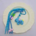 Cute resin pony keychain DIY bag charm pendant with blue lanyard and colorful beads. - Blue