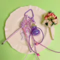 Purple braided keychain with holographic gourd pendant and star charm for bag decoration. - Electroplated Colorful Gourd-Purple / Purple