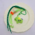 Cute green resin horse keychain and bag charm with woven strap, perfect DIY accessory for keys. - Green