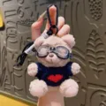 Cute plush bear keychain with glasses and red heart sweater, trendy bag charm pendant gift. - Black Sweater Bear