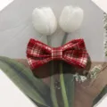 Close-up detail of red plaid fabric bow hair clip, cute preppy vintage hair accessory. - Small Double-layer Bow / 1 Piece/Pack / Red