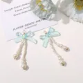 Exquisitos pendientes colgantes de perlas con lazo iridiscente largo DIY para mujeres. - Azul Iridiscente
