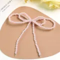 Pink imitation pearl bow DIY handmade shoe flower accessory bag charm for elegant fashion styles. - Pink