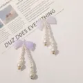 Handmade DIY iridescent purple bow long pearl drop earrings and accessory for women. - Glitter Light Purple