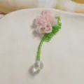 Close up detail of handmade beaded flower pendant with pink petals and clear crystal ball drop. - Light Pink