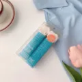 Detail view of portable hair roller pins set for creating natural volume and styling roots easily. - 2 Pieces/Pack / Blue
