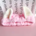 Cute pink plush cat ear headband for washing face, makeup, and daily skincare routine wear. - Deep Pink