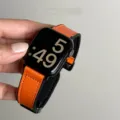 Gedetailleerd overzicht van de oranje lederen siliconen magnetische horlogeband voor Apple. - Glad - oranje [Magnetische zwarte sluiting]