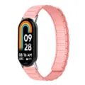 Cinturino di ricambio in silicone magnetico rosa per fitness tracker, elegante e resistente. - Sabbia Rosa