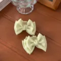 Molla per capelli con fiocco in raso verde chiaro, fermaglio dolce per stile donna. - Verde