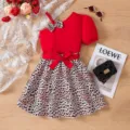 Completo bambina con top rosso monospalla e gonna leopardata con cintura a fiocco - Top E Pantaloni / 3-4Y