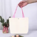 Minimalistische blanko weiße Canvas-Einkaufstasche mit langen pastellrosa Henkeln - Rosa Griff Leeres Modell / 27*22*10cm