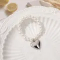 White pearl beaded bracelet with a silver heart pendant featuring lovely engraved text details. - 6mm Style 4 (1 Piece)