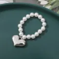 Chic white pearl bracelet with a cute silver puffy heart pendant, stylish Y2K fashion jewelry. - 8mm Large Flat Heart Bead (1 Piece)