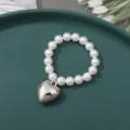 White pearl bead bracelet with shiny silver heart pendant, elegant jewelry accessory for women. - 8mm Medium Puffy Heart (1 Piece)