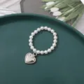 Charming white pearl beaded bracelet with a silver heart pendant, sweet and cute jewelry gift. - 6mm Patterned Heart (1 Piece)
