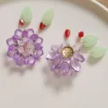 Handmade DIY crystal lotus flower hair accessories materials with purple petals and green leaves. - Purple