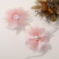 Pink tulle flower DIY hair accessories featuring elegant pearls, soft feathers and delicate beads. - Pink