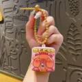 Lindo Capybara Pop Bubble Llavero Correa de Silicona Colgante de Bolsa Creativo - Carpincho que sopla burbujas - Cara enfadada