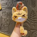 Portachiavi in peluche a forma di gatto carino con coda estraibile e ciondolo borsa morbido. - Testa di gatto con coda tirabile - gatto rosso