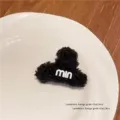 Morsetto per capelli nero soffice e piccolo da donna, fermaglio invernale in lana d'agnello. - Nero