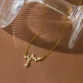 Elegant gold tone stainless steel heartbeat crystal pendant clavicle necklace for daily wear. - Heartbeat Style (T0956) / Gold
