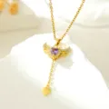 Gold angel wings pendant necklace with purple heart gemstone and delicate dangling chain. - Angel Wing Heart Necklace (T1289)