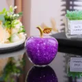 Crystal apple ornament detail view showcasing internal purple crystal beads and gold stem. - 5cm / Purple