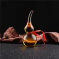 Crystal glass gourd ornament detail close up view decorative lucky feng shui piece. - Golden Yellow