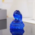 Blue crystal snake figurine detail showcasing exquisite scales and glossy finish for home decor. - Blue