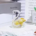 Crystal swan figurine featuring faceted yellow crystals displayed on a white stone base. - Solid / 5cm / Gold Yellow