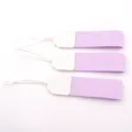 Detailed close-up view of portable purple cup straps with white leather connectors for bottles. - Purple