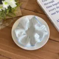 Detailed view of a sweet blue polka dot fabric scrunchie, soft texture and fresh style. - C Style-Polka Dot
