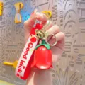 Red rose flower keychain with cute bear bell and Good Luck strap, perfect backpack charm gift. - Rose Flower (Sounding) / Red