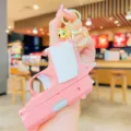 Simpatico portachiavi con pistola giocattolo di decompressione rosa con campanello. - Rosa