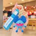 Porte-clés personnage de dessin animé duveteux bleu, variante mignonne de poupée monstre. - Cheveux Explosifs Bleus