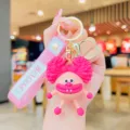 Mignon porte-clés de poupée de dessin animé rose avec cheveux duveteux et anneau métallique. - Cheveux Explosifs Rose Rouge