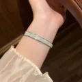 Elegant multi-row crystal paved silver titanium steel bangle bracelet for women fashion jewelry. - Four Row Rhinestone Starry Sky Style / Silver