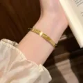 Gold titanium steel cuff bracelet with engraved letters and love hearts for women daily wear. - Letter ILOVEYOU Style / Gold