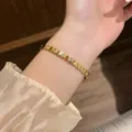Gold hexagonal honeycomb rhinestone bracelet, stylish titanium steel jewelry for women. - Honeycomb Inlaid Style / Gold