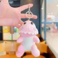 Llavero de peluche de dinosaurio tierno, colgante de mochila rosa y accesorio suave. - Rosa
