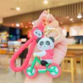Cute panda bicycle keychain pendant, stylish pink silicone bag charm for students, lovely gift. - Pink