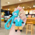 Cute cartoon panda keychain with blue hoodie and strap, stylish bag pendant gift accessory. - Teal