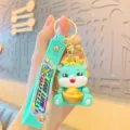 Cute cartoon dragon keychain holding gold ingot keyring charm bag pendant gift item - Blue Ingot Dragon