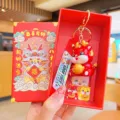 Cute cartoon dragon keychain with gift box, Chinese New Year lucky mascot pendant and keyring. - Red Dragon With Gift Box / Red