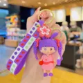 Cute cartoon girl keychain with purple pigtails and strap pendant for bag charm gift - Purple