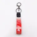 Gradient woven strap keychain with metal ring and clasp, stylish bag pendant accessory. - Red
